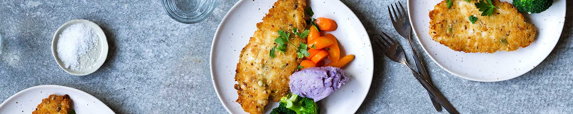 Filets mit Kernen zu lila Sellerie-Kartoffel-Stock